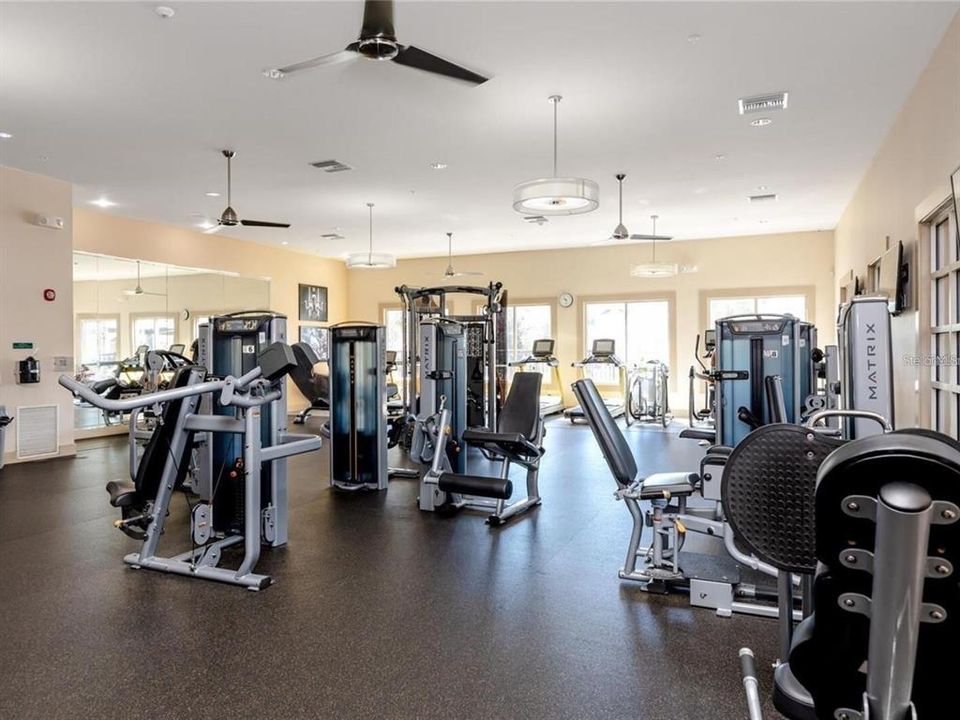 Eagle Creek Community offers amenities such as a Clubhouse, Fitness Center, Gated Community - Guard, Golf Carts OK, Playground, Pool, Restaurant, Tennis Courts and Racketball.