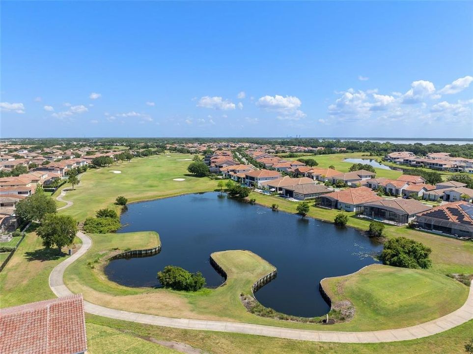 Eagle Creek Community offers amenities such as a Clubhouse, Fitness Center, Gated Community - Guard, Golf Carts OK, Playground, Pool, Restaurant, Tennis Courts and Racketball.