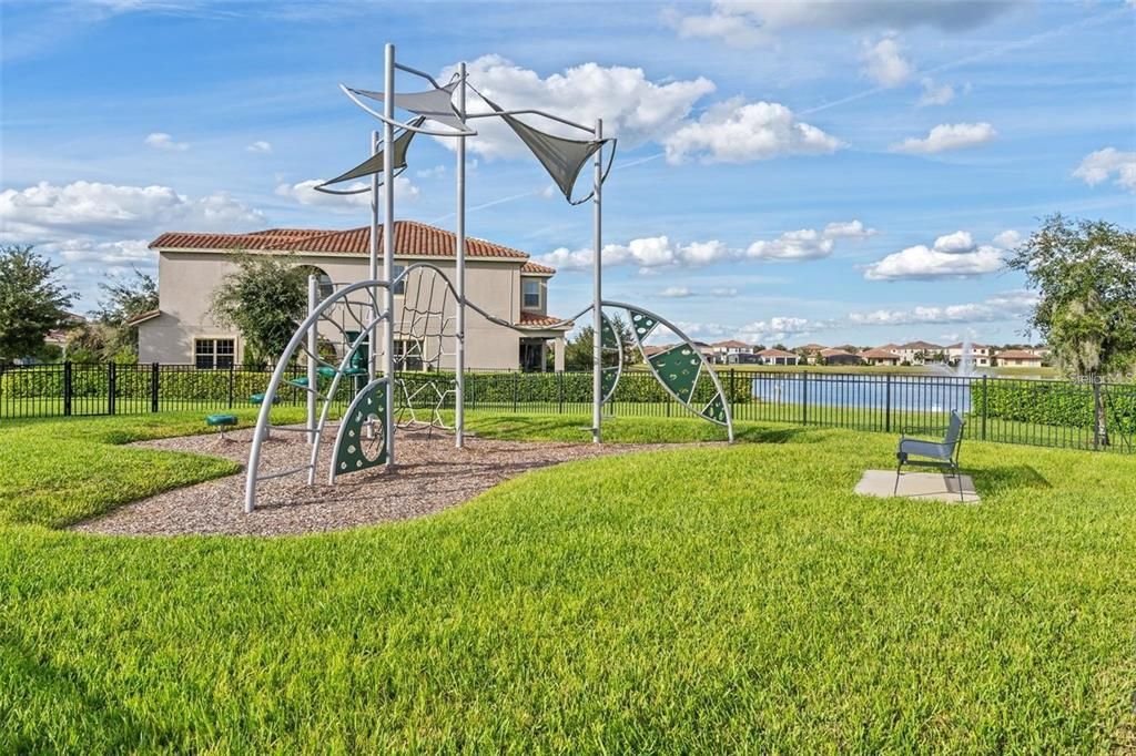 Eagle Creek Community offers amenities such as a Clubhouse, Fitness Center, Gated Community - Guard, Golf Carts OK, Playground, Pool, Restaurant, Tennis Courts and Racketball.