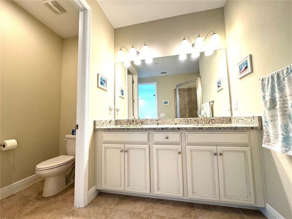 En-suite bathroom with private commode