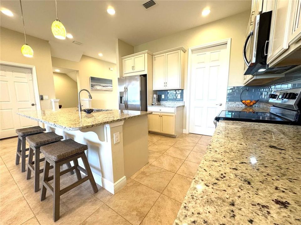 Beautiful blue-gray subway tiled backsplash!