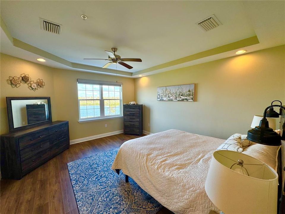 Master suite with tray ceiling and picturesque water views!!