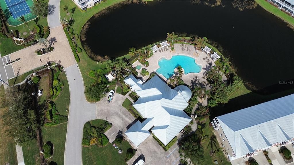 Aerial of the community clubhouse, resort style pool and spa! Tennis/pickleball too!