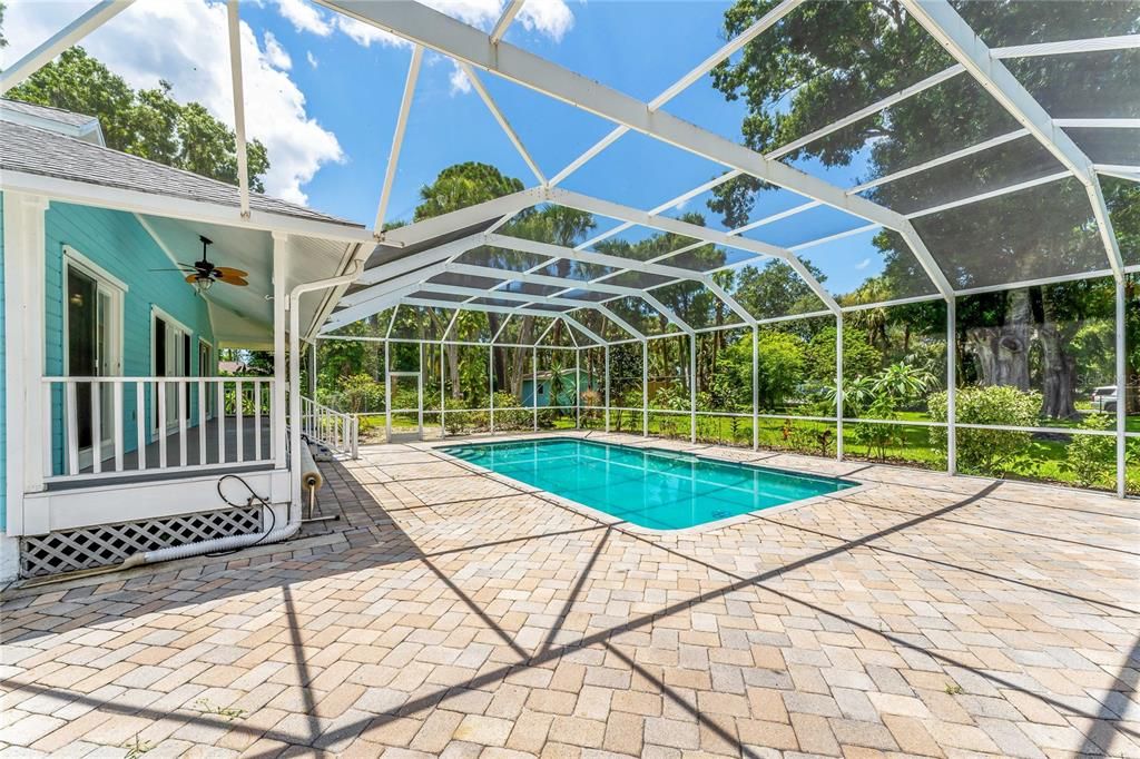 Large pool area with pavers