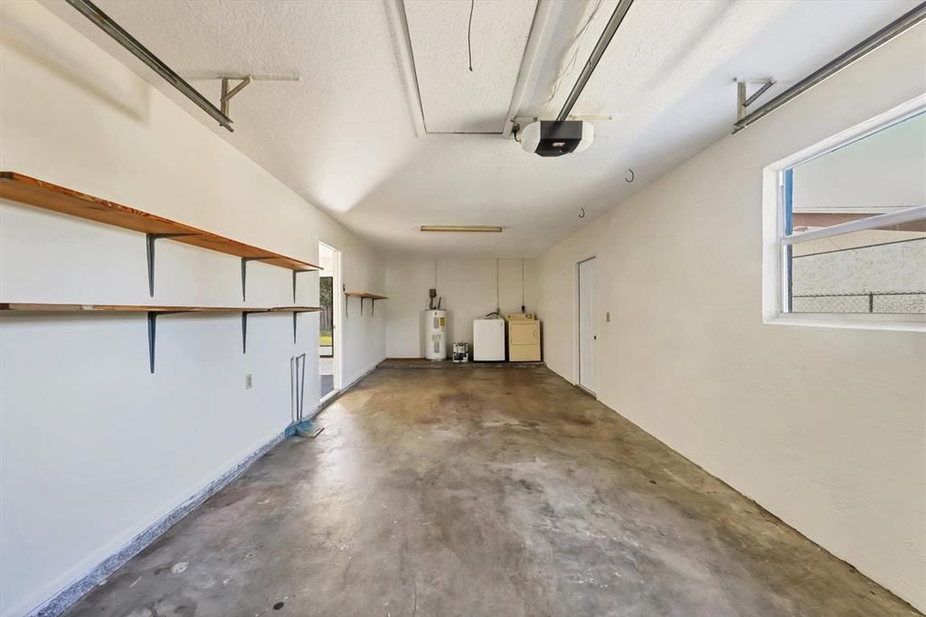 Garage interior with washer/dryer at rear