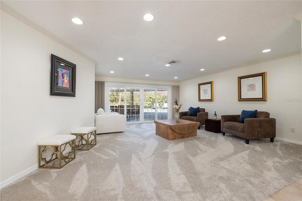 Gorgeous Living room with sliders to pool