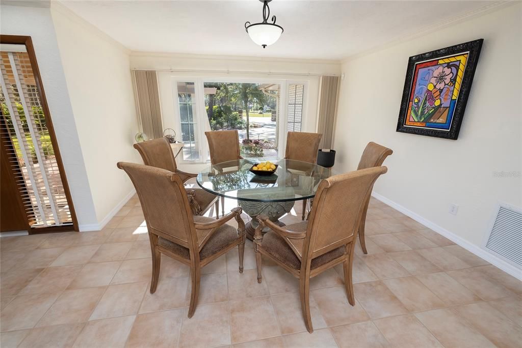 Dining room with large front window