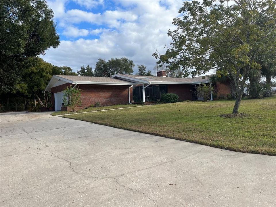 Great double driveway with plenty space for company to park.  Also, this home sits high and dry, so no worries about flooding!