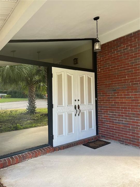 Front entryway into nice sized foyer with entry closet.