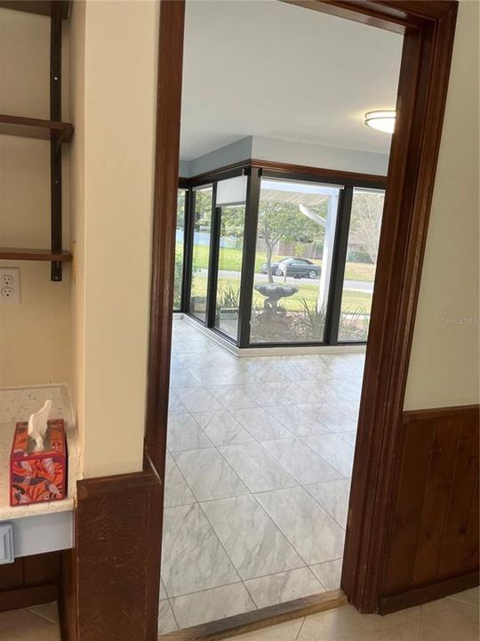 Looking from kitchen into dining/living area.