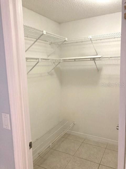 Primary walk-in closet.