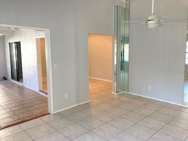 Living room leads into a Florida room, and a bonus/office space.