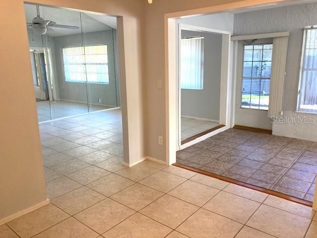 Centrally located in the home, this open office space/bonus room, can be purposed in many ways to suit your own needs.  Though an interior room, it boasts good natural light.