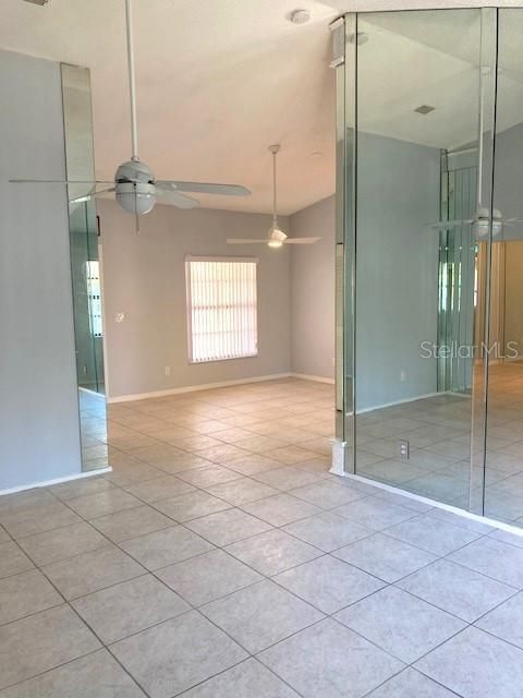 From the living room, looking back to the dining area toward the front of the home.