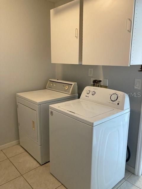 Washer and dryer, in the utility room just off the kitchen.