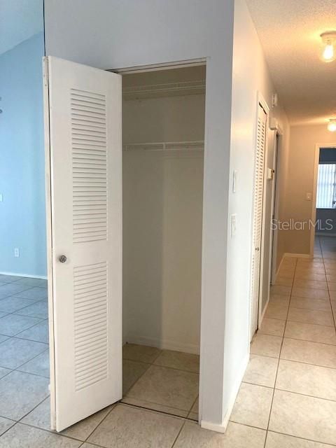 Entryway coat closet, spacious.