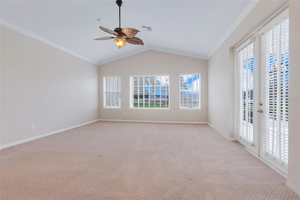 Primary Bathroom with soaking tub, handicap accessible/walk-in shower, solid wood cabinets, quartz countertops, and separate water closet.