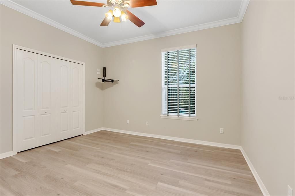 Guest Bedroom (3) features luxury vinyl flooring and spacious closet.