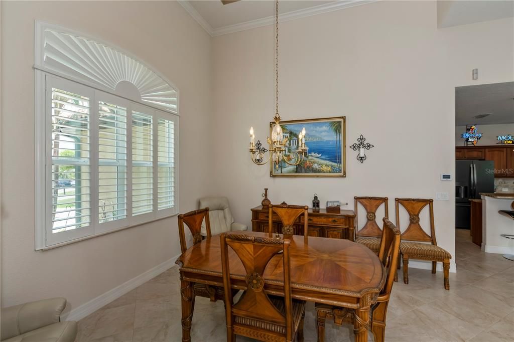 separate dining room is spacious, plantation shutters