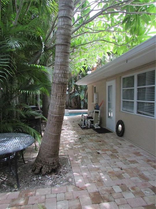 Back of house / pool equipment / sitting area.