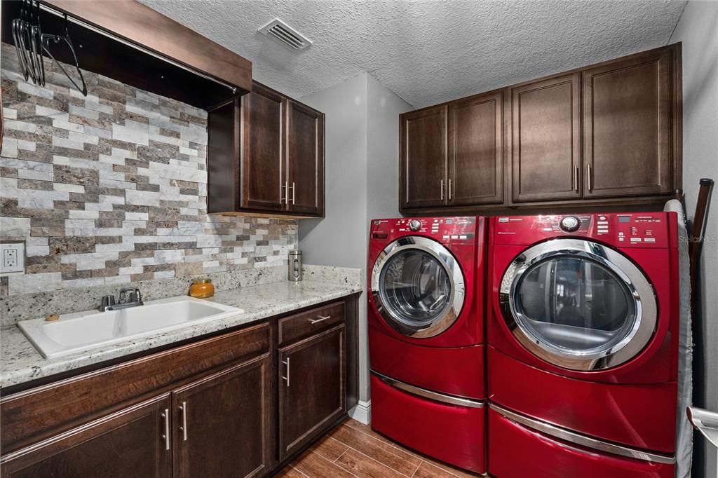 Quartz and tons of space in laundry room!