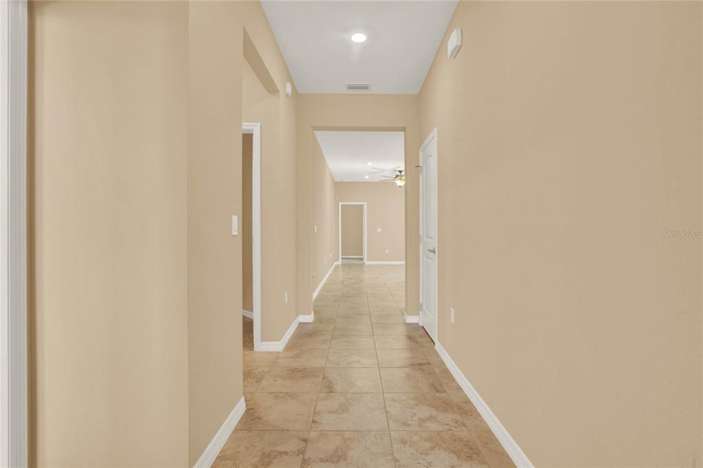 WELCOMING TILED ENTRY,HIGH CEILINGS, CLEAN COASTAL COLOR PALETTE-2020 LIKE-NEW HOME WITH LAYERS OF UPGRADES!