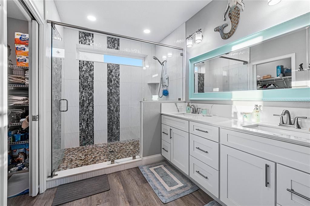 Oversized Shower with Double Sink Vanities and  Custom Mirror