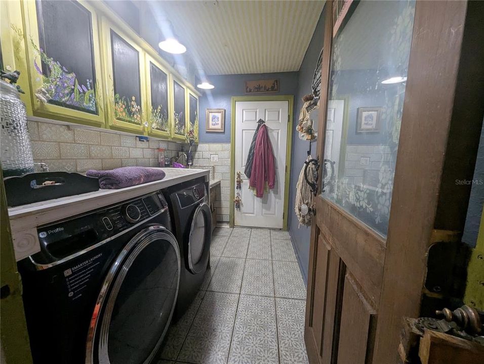 Hand Painted Cabinets in Laundry