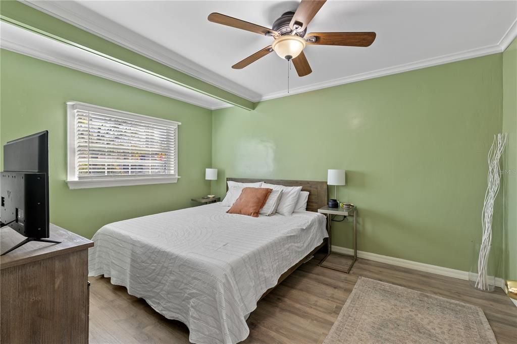 Primary bedroom featuring a fresh coat of paint.