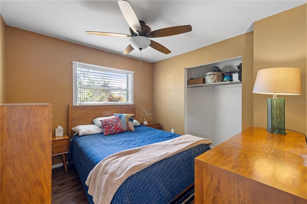 Bedroom 2 featuring laminate flooring.