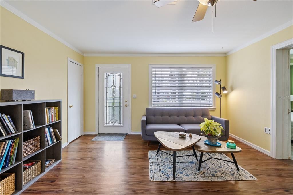 Main living area featuring laminate flooring that flows throughout the entire home.