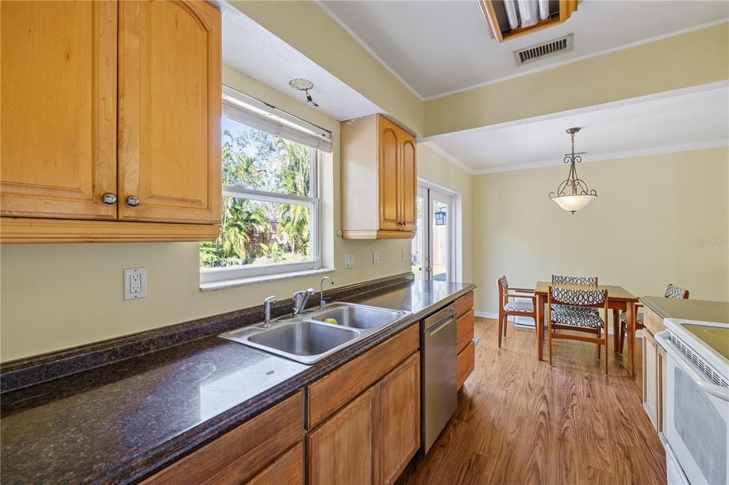 Kitchen area featuring plenty of counter space for cooking.