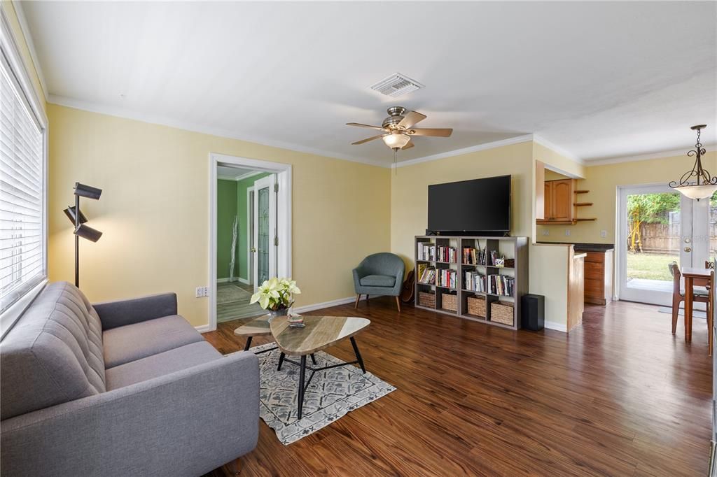 Main living area featuring crown molding that flows throughout the entire home.