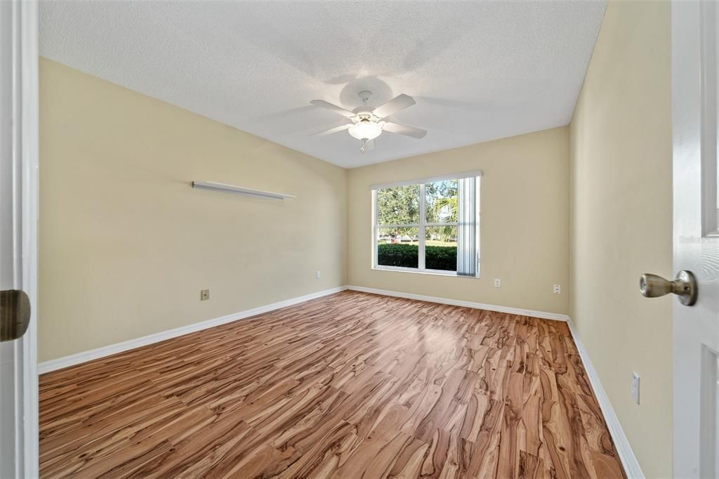 Guest bedroom with golf course views