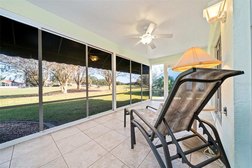 Enclosed Lanai overlooking golf course.