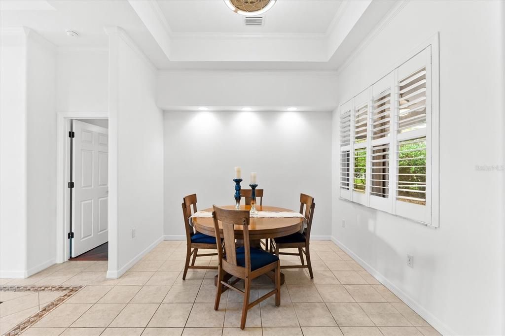 Bright kitchen with breakfast amd stainless steel appliances