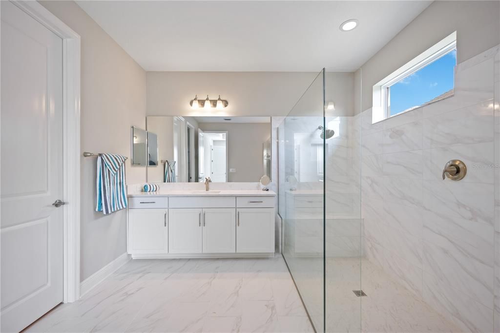 Main bathroom with large walk-in shower