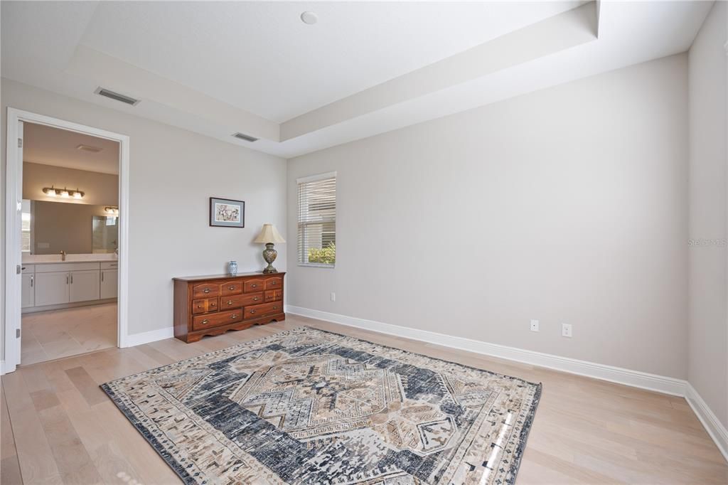 Main bedroom with coffered ceiling