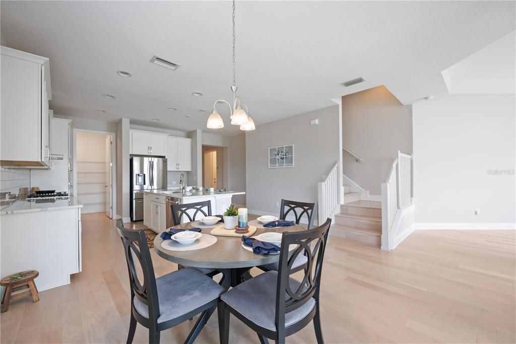 View of the dining are, the kitchen and the pantry