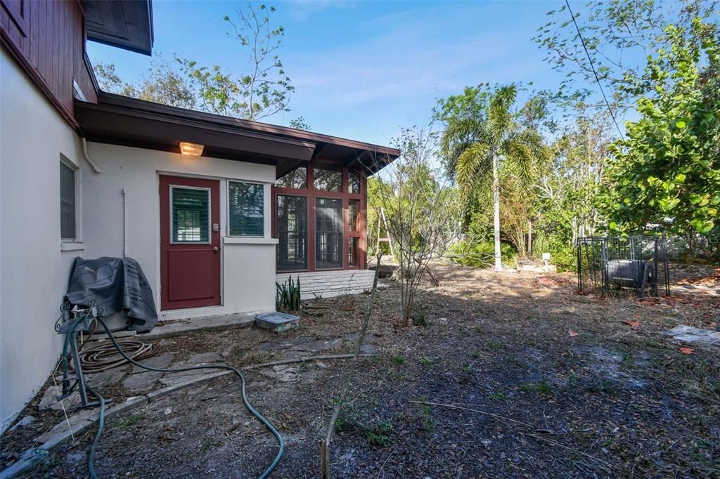 Exterior of Family Sunroom & Entrance to Kitchen