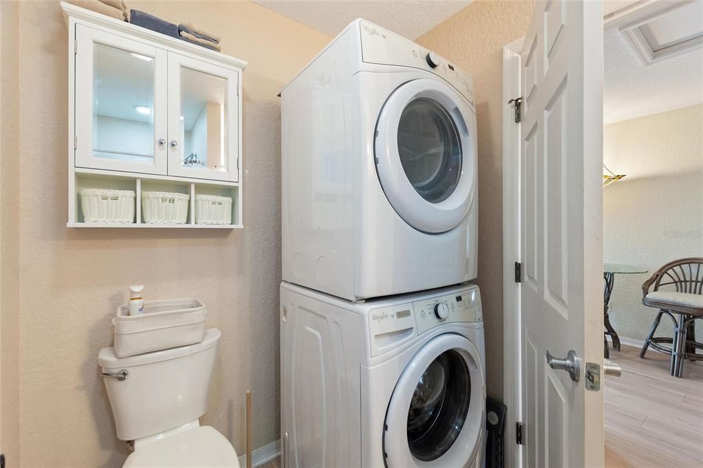 FULL SIZE STACK WASHER-DRY IN BATHROOM