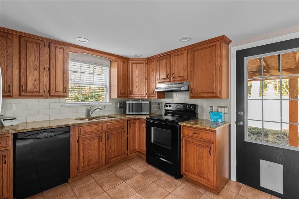 Kitchen leading out to backyard