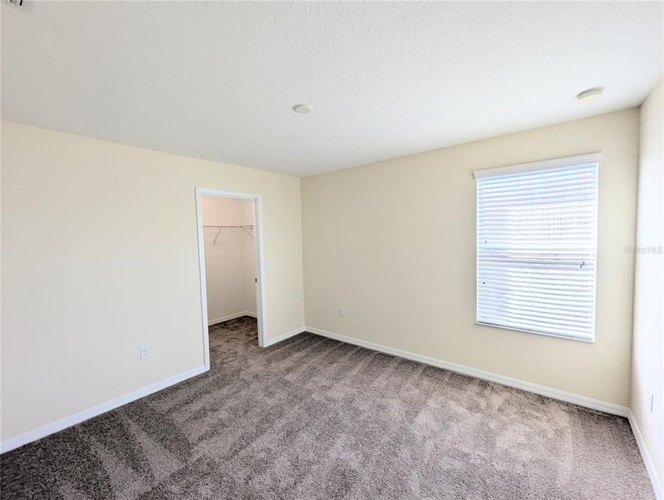 Upstairs Bedroom 2 with walk-in closet