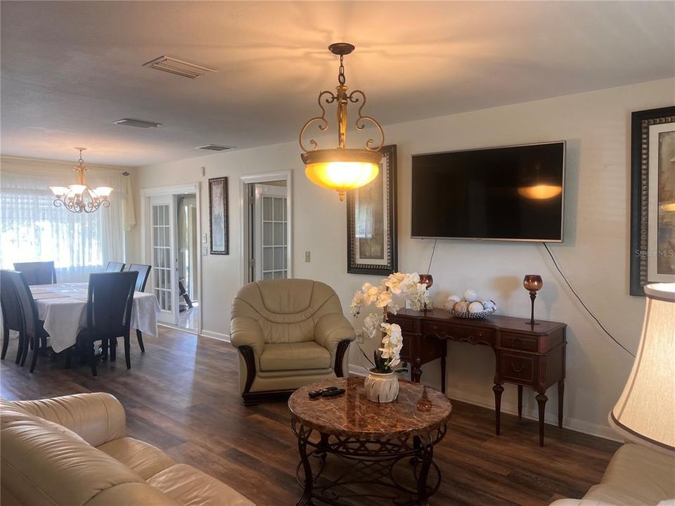 Living Room with Dining Room in background