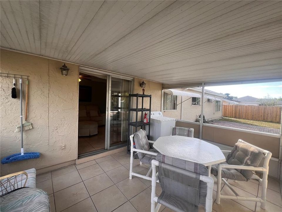 Screened back porch with Washer in lanai