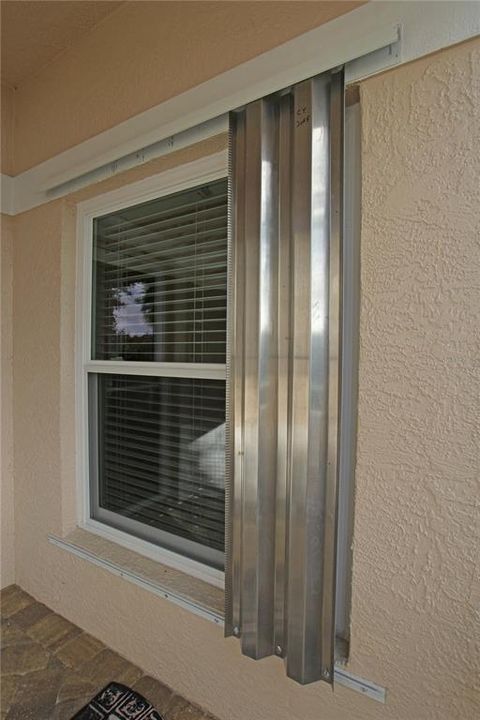 Metal Hurricane Shutters for all glass windows & Doors