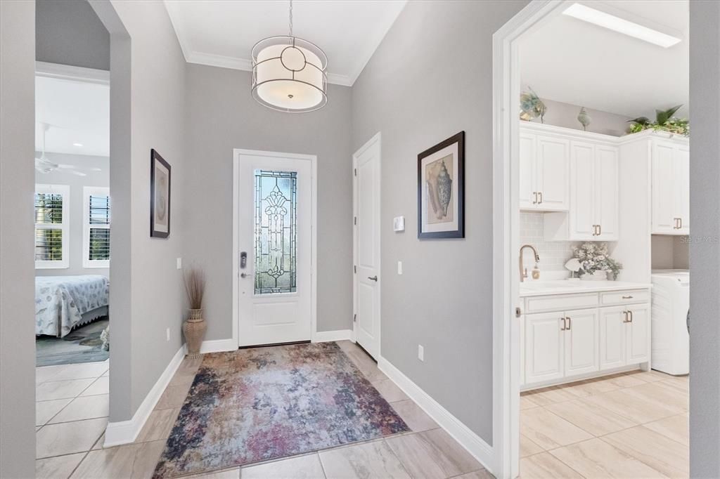 Foyer provides 11-foot tall ceilings