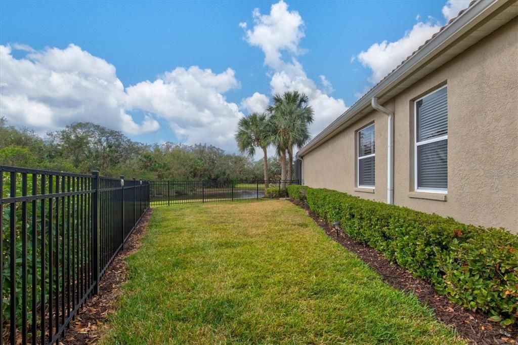 View of the large dog run at the side of the home.