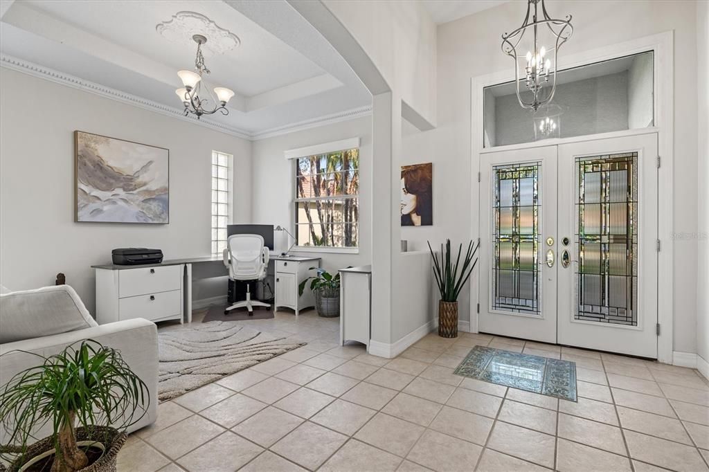 Bright and inviting entrance with soaring 14 foot ceilings.