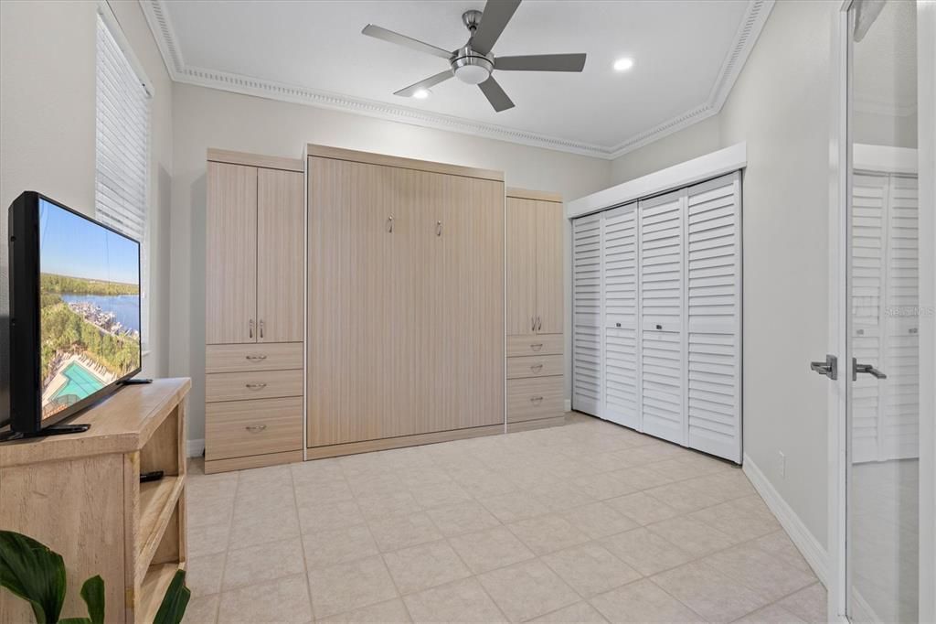 The second bedroom located at the front of the home is a flexible space as well, featuring a murphy bed!